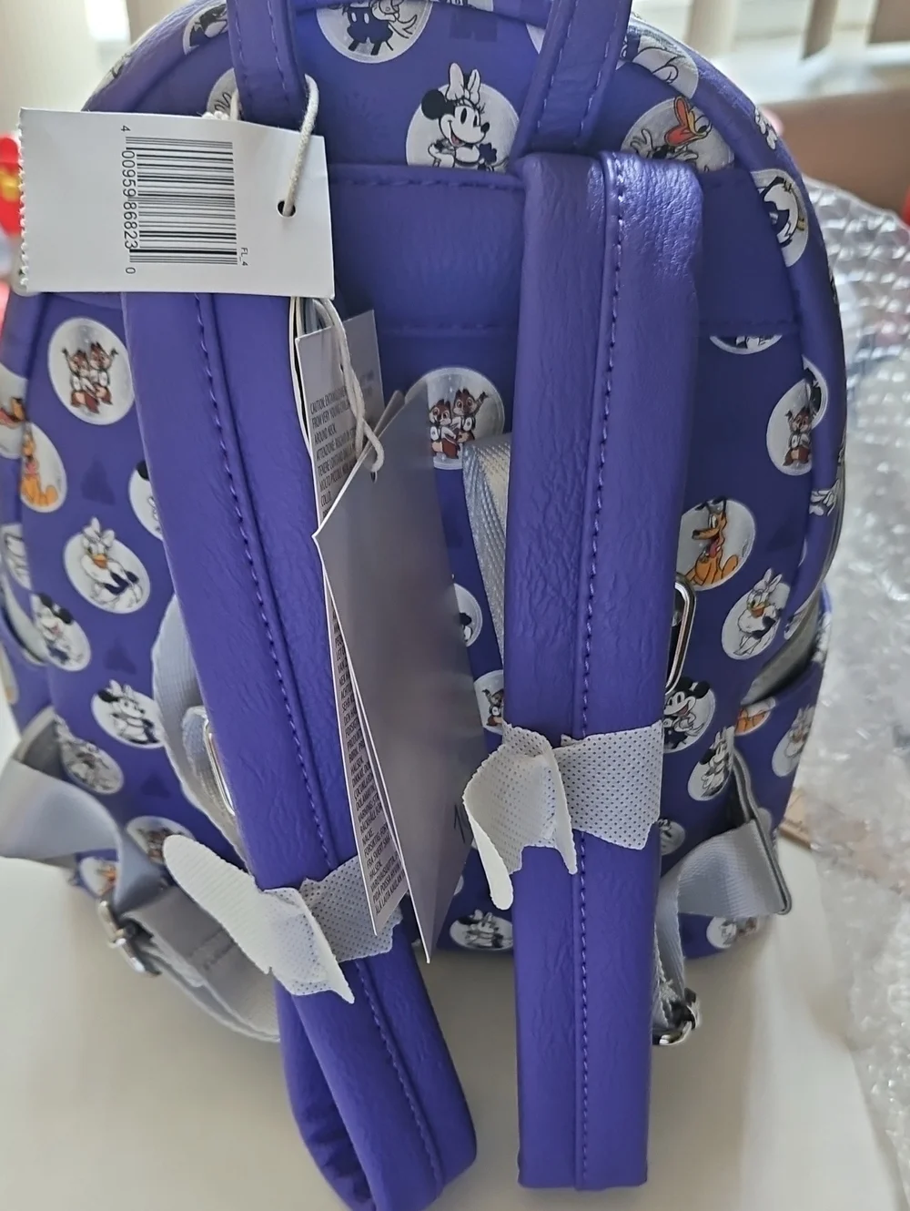 NWT Disney 100th Loungefly Purple Disney Parks Character Mini Backpack